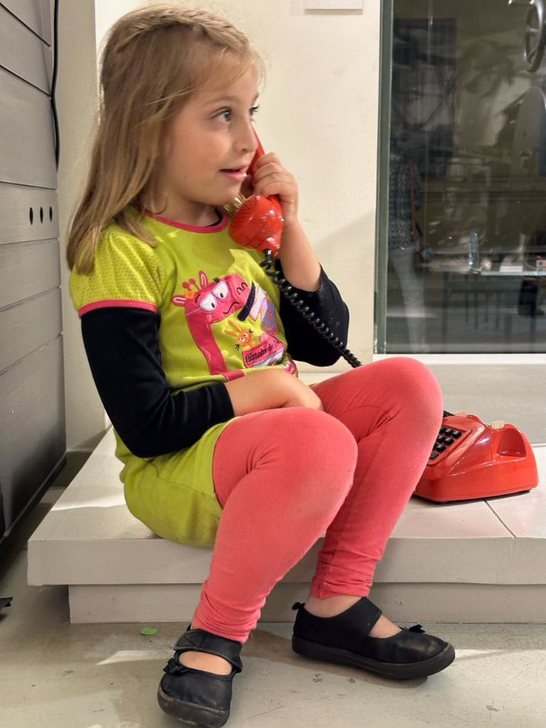 Ellie at the phone!